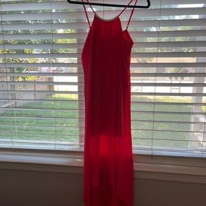 Hi/low dress. Coral color with a gold scoop high neckline.